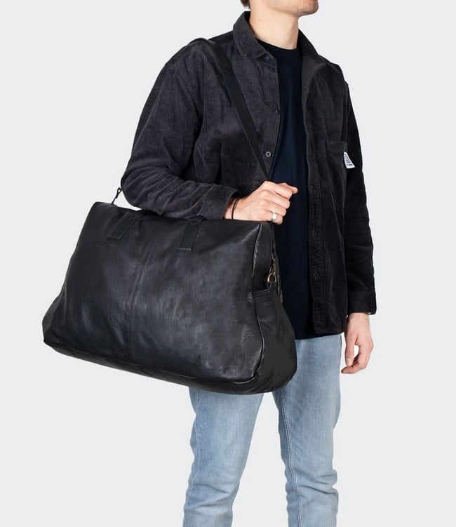 Visuel homme avec sac 48h cuir noir Melrose